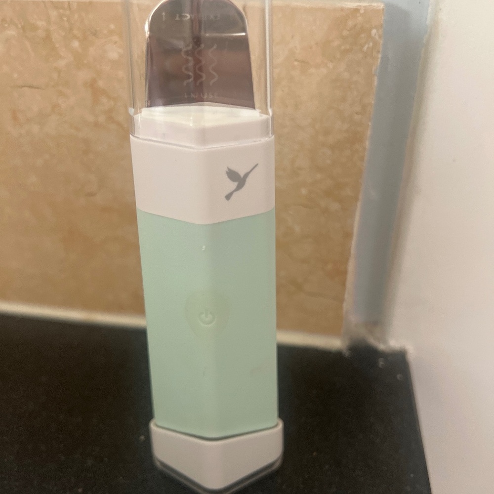 Sea Foam Green Dermapore device